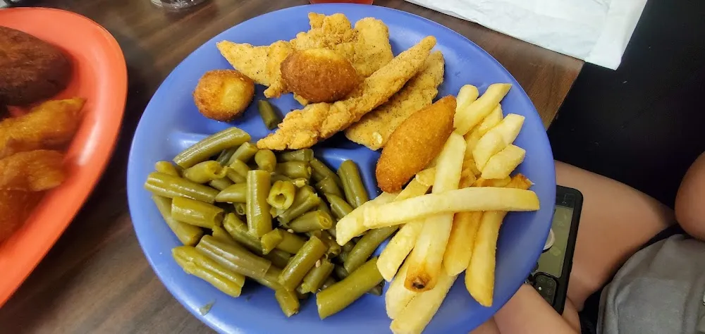 Chicken Strips Hush Puppies and French Fries